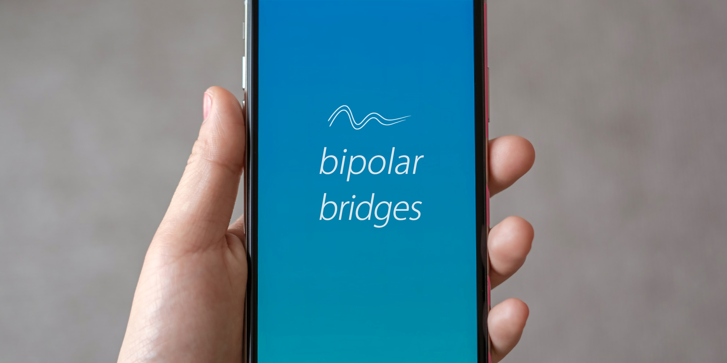 Phone with 'Bipolar Bridges' on the screen