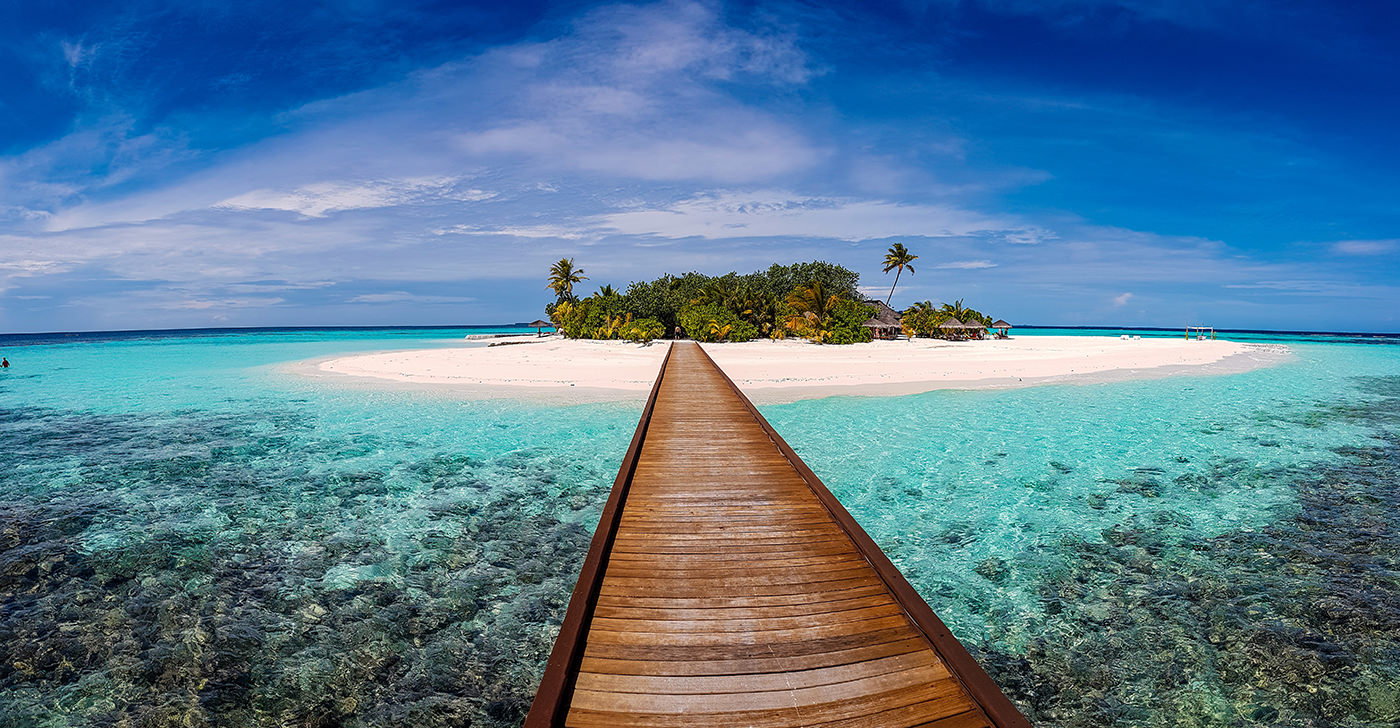 Island with a bridge leading up to it.