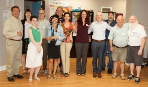 Raymond standing at a community centre with multiple members of the CREST.BD network, including Dr. Erin Michalak, Dr. Greg Murray, Dr. Emma Morton, Nusha Balram-Elliot, and Victoria Maxwell.